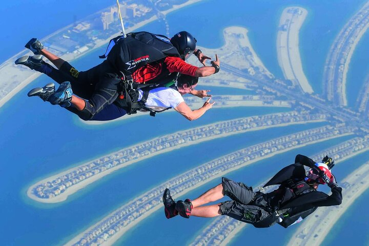 Soar above Dubai's iconic skyline experiencing the breathtaking views and exhilarating free-fall as you glide over the stunning Palm Jumeirah. A true adventure awaits every skydiver.